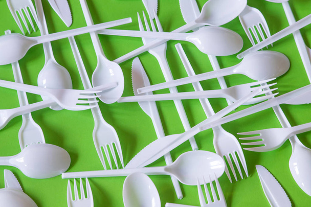 Plastic disposable cutlery, forbidden in European Union. - Foto, afbeelding
