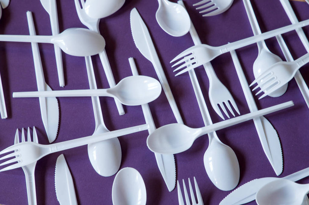 Plastic disposable cutlery, forbidden in European Union. - Фото, зображення