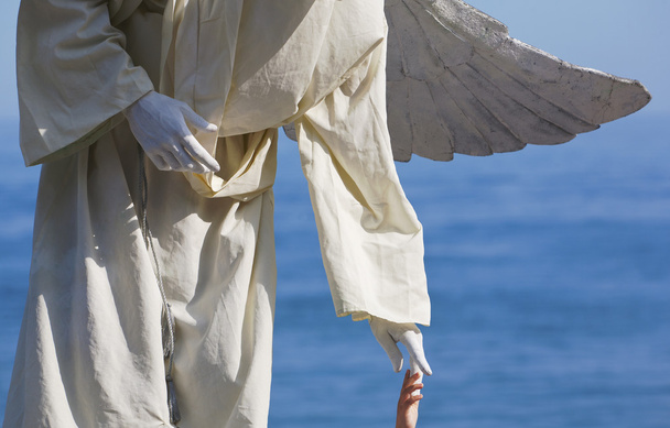 animador con alas de ángel
 - Foto, Imagen