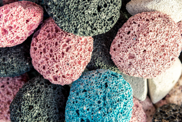 Multi-colored pumice stones for the whole frame. Selective focus - Photo, Image