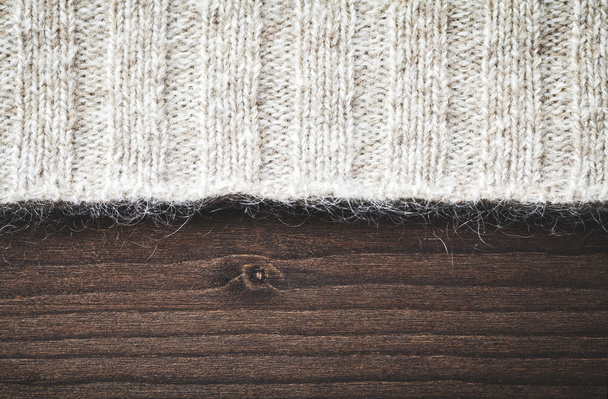 suéter de lana en madera
 - Foto, imagen