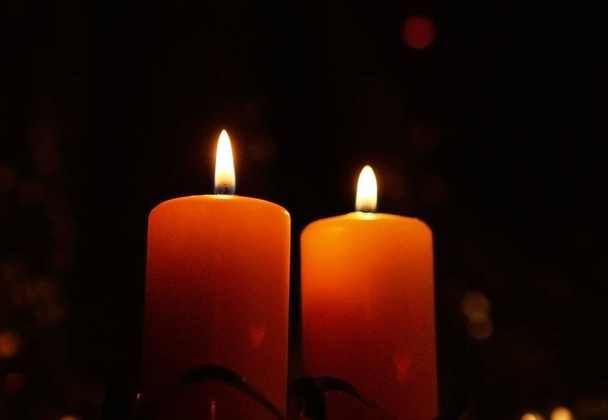 candles burning in the dark - Foto, Imagen