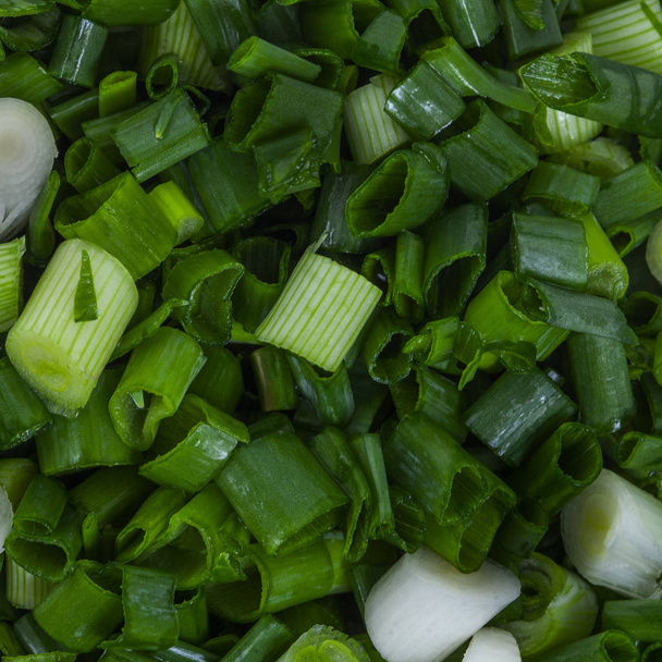 Chopped young green onion, background - Photo, Image