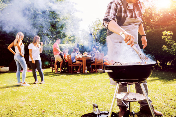 Diverse People Friends Hanging Out in Backyard. Barbeque Concept  - 写真・画像