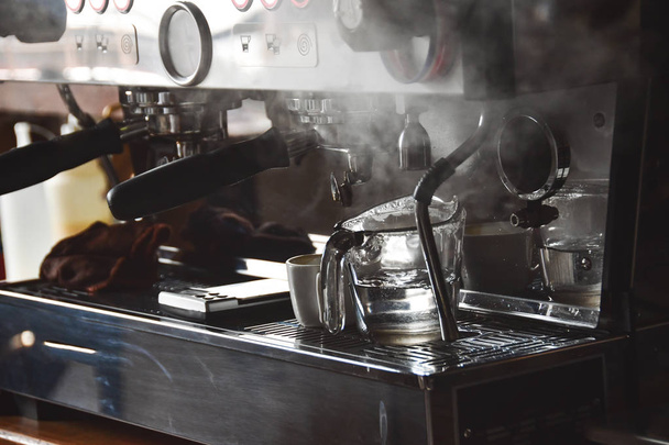 coffee machine making coffee in cafe - Foto, Bild