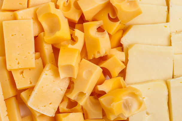 Surtido de diferentes tipos de queso holland, fondo
 - Foto, imagen