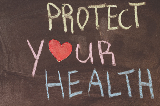 Texto de escritura: proteger su salud con tiza de colores
 - Foto, imagen