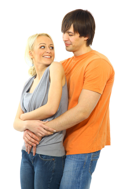 Happy smiling couple in love. Over white background - Photo, image