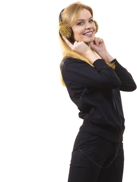 Teenage woman wearing headphones - Photo, Image