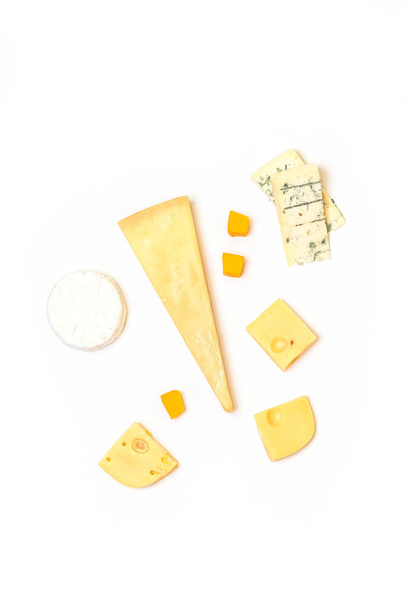 Different kinds of delicious cheese on white background - Photo, Image
