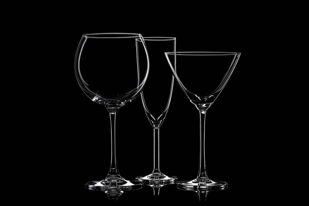 Glassware silhouettes on black. - Photo, Image