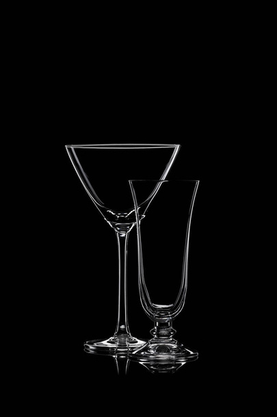Glassware silhouettes on black. - Zdjęcie, obraz