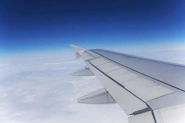 View out of airplane wing in flight - Φωτογραφία, εικόνα