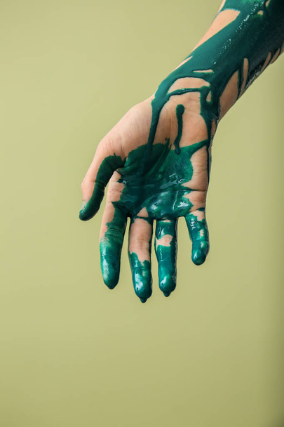 Painted hand on color background - Foto, imagen