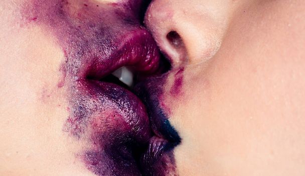 Lesbian couple kiss lips. Passionate kissing. Lipstick and lipgloss. Romantic dirty young lesbian couple kissing. - Photo, Image