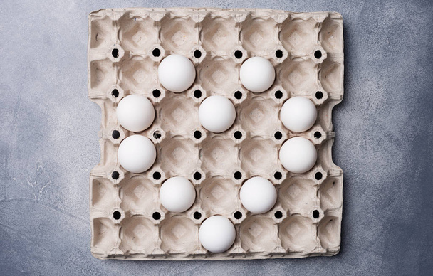 Heart shaped eggs in egg carton box - 写真・画像