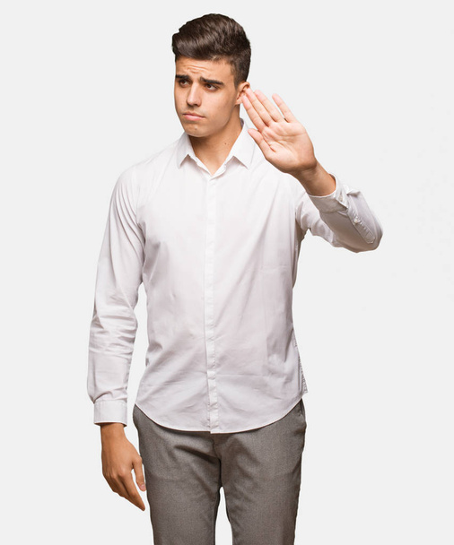 Young business cool man putting hand in front - Photo, Image