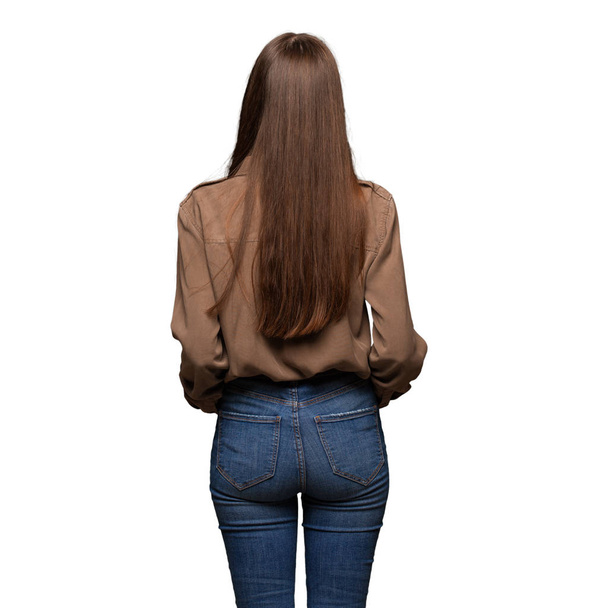 Young caucasian woman from behind, looking back - Fotoğraf, Görsel
