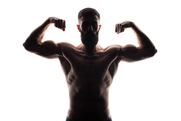 athlete bodybuilder man isolated over white - Photo, image