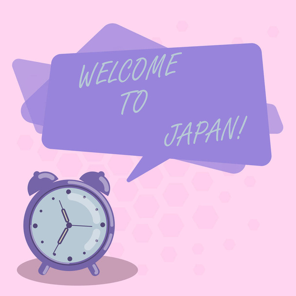 Szöveg írása Welcome To Japan szó. Üzleti koncepció megérkezett ázsiai modern ország különböző kulturális Üres téglalap alakú beszéd buborék Színátfedés és analóg ébresztőórával. - Fotó, kép