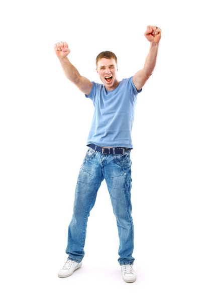 Feliz hombre celebrando su éxito aislado sobre un fondo blanco
 - Foto, imagen