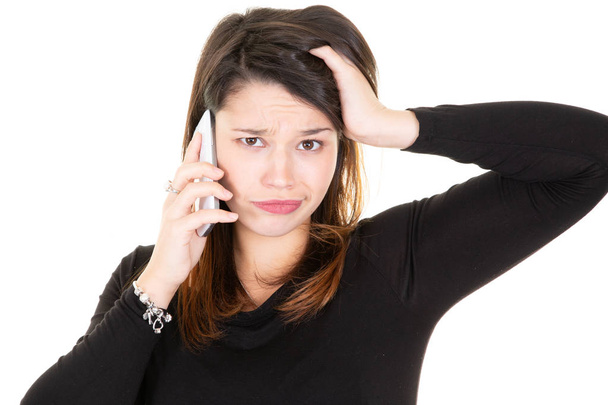 portrait of young frustrated woman talking on the phone - Foto, Imagen