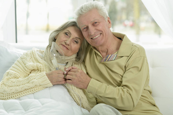 sick  senior woman with her husband  - Photo, Image