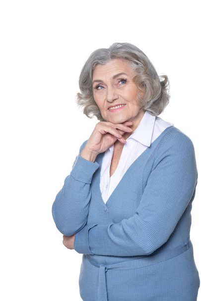 portrait of beautiful senior woman, posing against white background - Foto, Imagen
