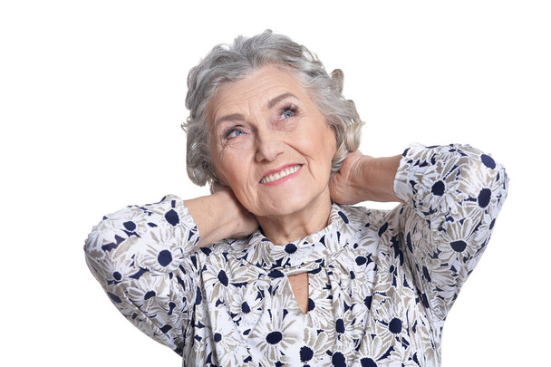 portrait of beautiful senior woman, posing against white background - Foto, Imagem