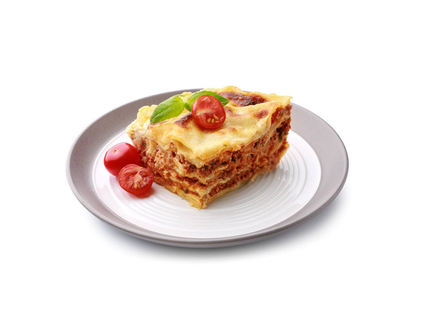 Plate with tasty baked lasagna on white background - Photo, Image