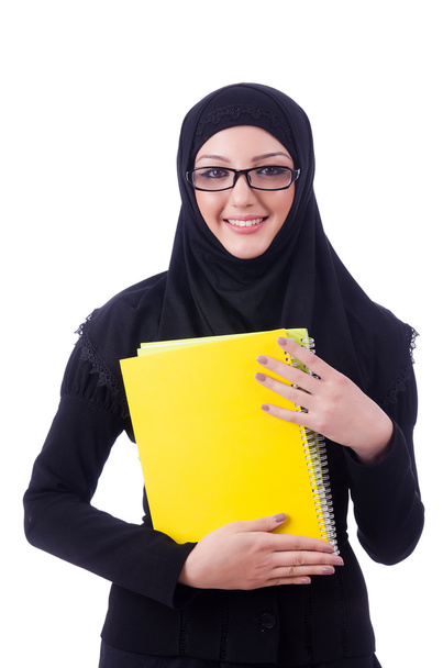 Young muslim woman with book on white - Photo, Image