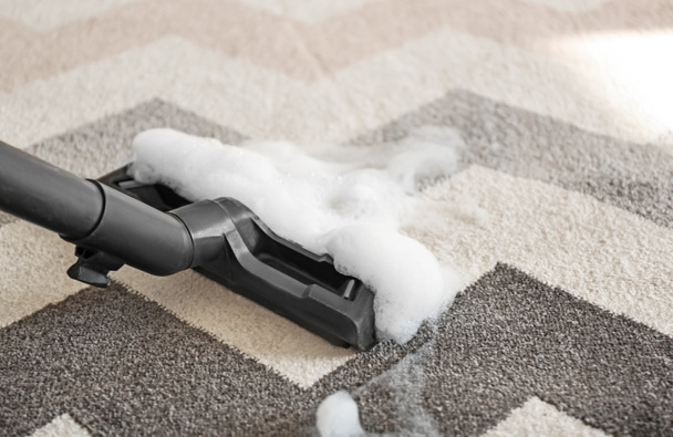 Washing of carpet with vacuum cleaner - Photo, Image
