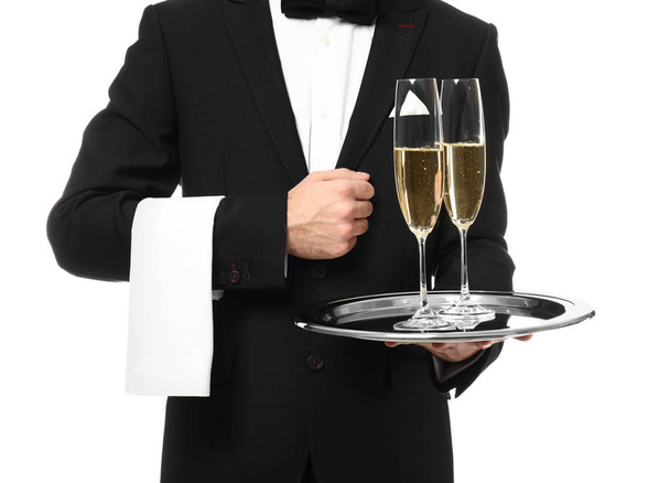 Waiter with glasses of champagne on white background - Photo, Image