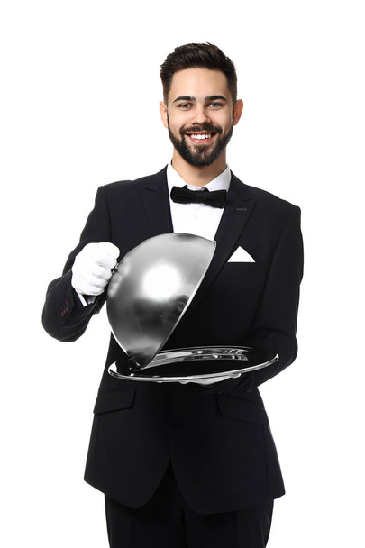 Waiter with tray and cloche on white background - Photo, Image