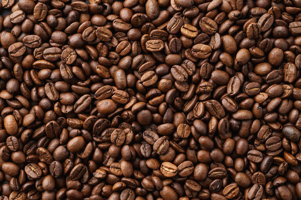 焙煎したコーヒー豆の背景。最上階だ。テキストのスペース. - 写真・画像