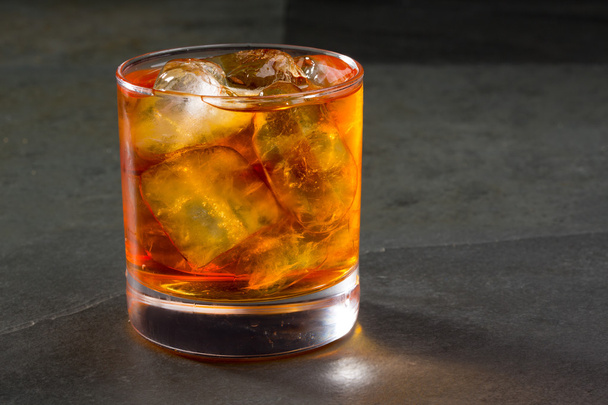 Whiskey whisky on the rocks on glass - Foto, imagen