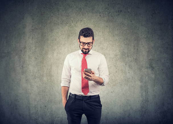 Young businessman using a mobile phone - Photo, image