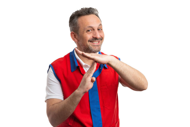 Funcionário do supermercado de mãos dadas como gestos de time-out
 - Foto, Imagem