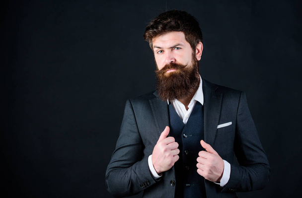 Impeccable style. Businessman fashionable outfit black background. Man bearded guy wear suit outfit. Perfect elegant tuxedo outfit. Elegancy and male style. Fashion concept. Guy wear formal outfit - Фото, изображение