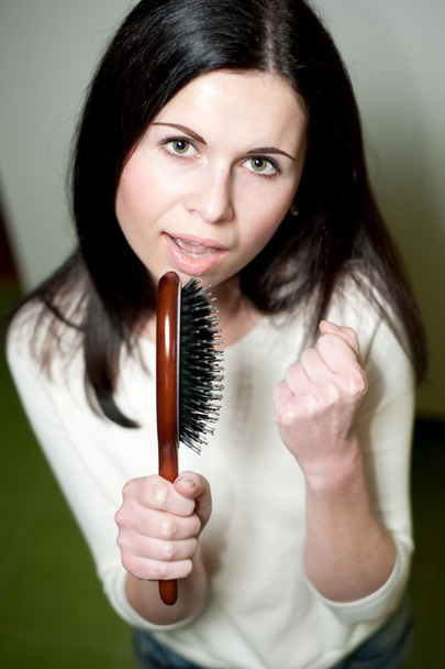 Girl singing on her hairbrush - Fotografie, Obrázek