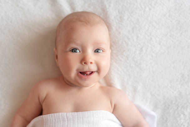 A small baby in a good mood. - Foto, immagini
