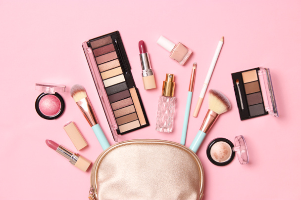 professional makeup tools. Makeup products on a colored background top view. A set of various products for makeup. - Foto, immagini