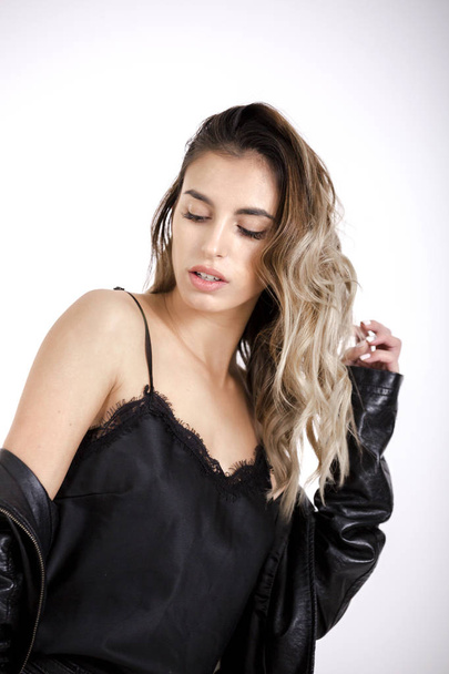  beauty girl in Black leather jacket studio shoot - Фото, зображення