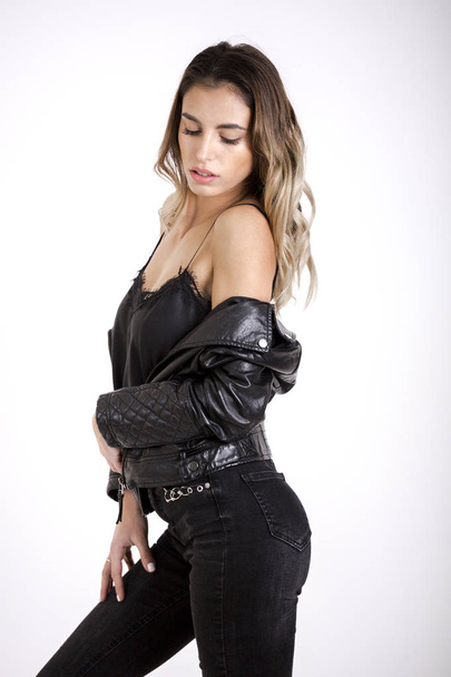  beauty girl in Black leather jacket studio shoot - Photo, Image