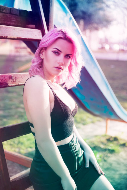 Portrait of beautiful woman with dyed pink hair - Фото, зображення