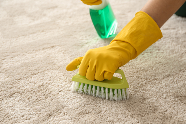 Worker cleaning carpet, closeup - Photo, Image