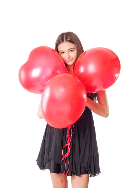 Beautiful girl with red balloon in form heart - Fotografie, Obrázek