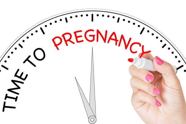 Žena ruční psaní čas na těhotenství zprávu s červenou značkou na  - Fotografie, Obrázek