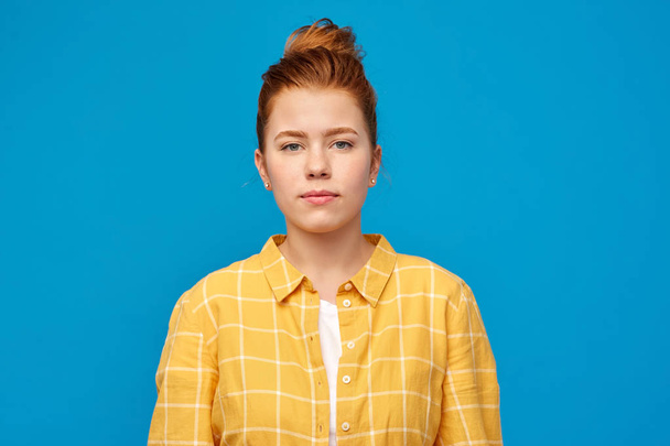 red haired teenage girl in checkered shirt - Fotoğraf, Görsel