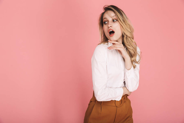 Image of surprised blond woman 30s in stylish outfit expressing  - Fotó, kép